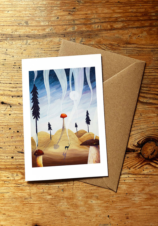 Greeting card with mushroom and nature-themed illustration on a wooden surface